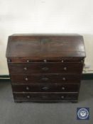 A 19th century continental oak bureau