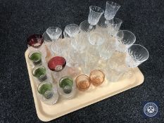 A tray of assorted drinking glass