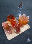 A tray of six coloured studio glass vases and bowls