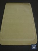 A hand tufted rug, loop cut cream, 120 cm x 180 cm, rrp £297.
