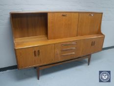 A mid 20th century teak G Plan sideboard