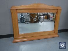 An overmantel mirror