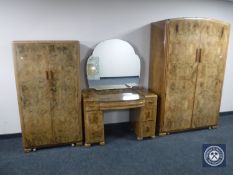 A three-piece burr walnut bedroom suite