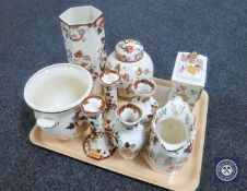 A tray of eight pieces of Masons Brown Velvet china including lidded ginger jar, mantel clock,