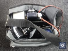 A camera bag containing Yashica SX-3,