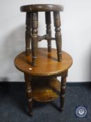 A circular pub table with stool