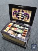 A faux mother of pearl and metal bound workbox