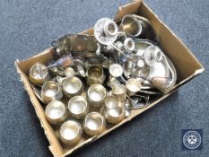 A box of 20th century plated wares including tankards, goblets,