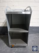 A Carimali three-tier warming stand