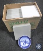 A box containing thirteen boxed Royal Copenhagen Plates of the Year