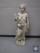 A composition garden statue,