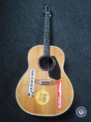 A vintage Applause electro acoustic bowl back guitar