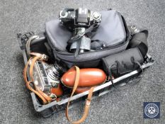 A basket of assorted cameras including Ricoh XR-20 SP camera with lens,