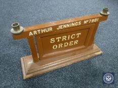 A wooden hand-painted reversible sign, Liberty Hall and Strict Order,