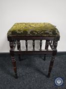 A Victorian mahogany piano stool