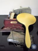 A vintage tin containing vintage glasses, plated and chain mail purses,