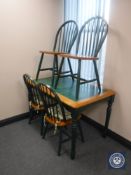 A contemporary tiled top kitchen table and four chairs