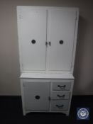 A mid 20th century kitchen cabinet