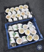 Two baskets of thirty-six stoneware History and Heraldry candles
