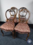 A set of four Victorian mahogany dining chairs