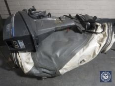 A Yamaha 4 stroke outboard motor together with an inflatable dinghy