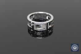 An 18ct gold diamond set ring by Gucci, 10.