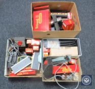 Four boxes containing Triang railways rolling stock accessories and control boxes