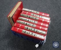 A basket of eight Orbis volumes,