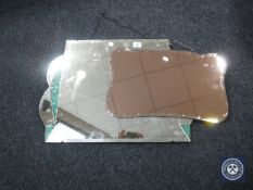 Two Art Deco unframed mirrors CONDITION REPORT: One mirror measures 55cm by 31cm.