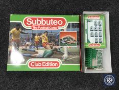 A boxed Subbuteo football game together with a further box of two football teams and accessories