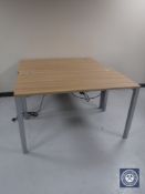 Two adjustable office work stations