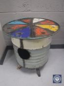 An oil drum occasional table