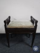 An Edwardian piano stool