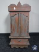 A painted double door cabinet fitted four drawers