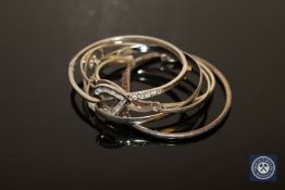 Four sterling silver and one white metal bangle (5)