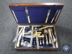 An Edwardian canteen of part silver plated cutlery.