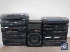 An Aiwa hifi together with a JVC hifi and speakers