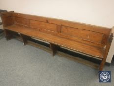 A pitch pine pew,