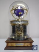 A contemporary 24 hour clock under glass dome CONDITION REPORT: I cannot see a