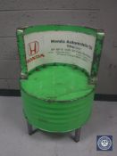 An oil drum tub chair