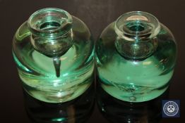 A pair of 19th century green glass dip pots.