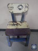 An oil drum dining chair