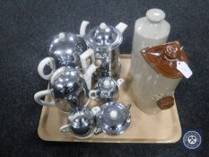 A tray containing two antique stoneware hot water bottles together with six pieces of mid 20th