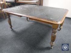 A Victorian mahogany dining table