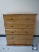 A pine five drawer chest