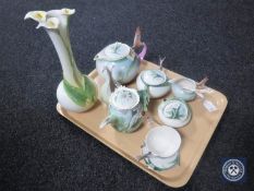 A tray of nine pieces of Franz & Graff decorative tea china and vases