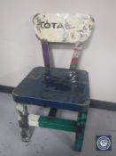 An oil drum dining chair