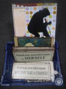 A basket of assorted metal signs