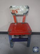 An oil drum dining chair