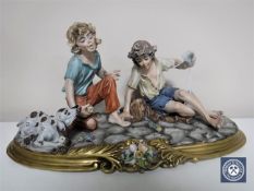 A Capo di Monte figure,